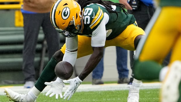 Green Bay Packers linebacker De'Vondre Campbell (59) recovers a fumble by Los Angeles Rams quarterback Brett Rypien during the first quarter of their game at Lambeau Field Sunday, November 5, 2023 in Green Bay, Wisconsin.
